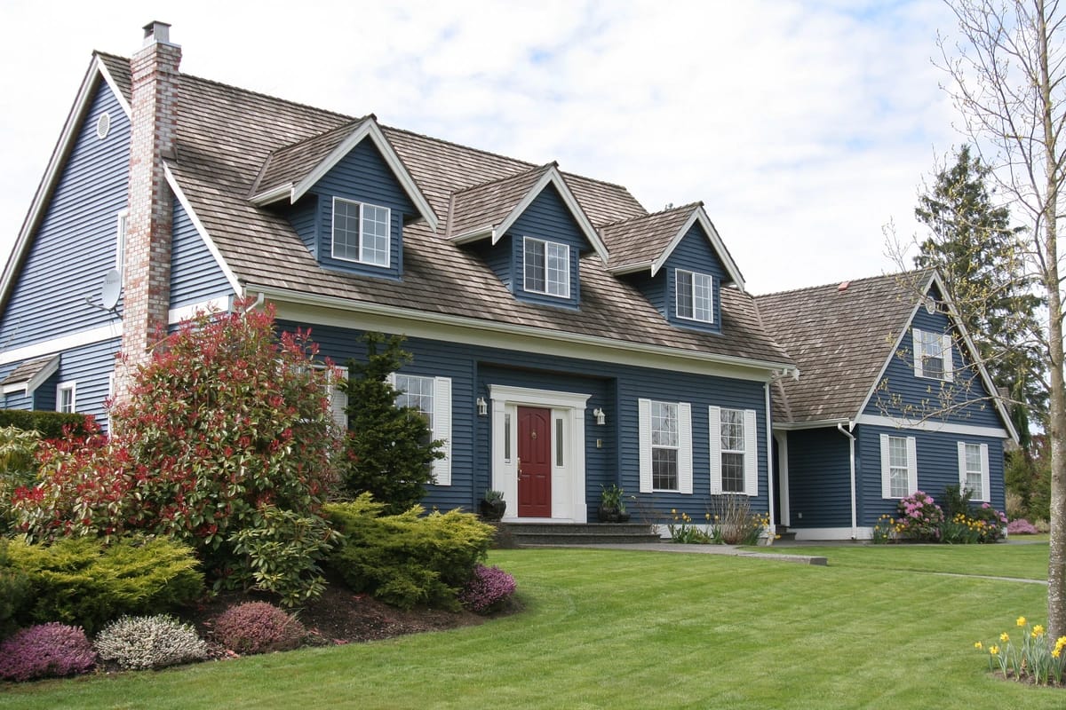 large house with asphalt shingle roof