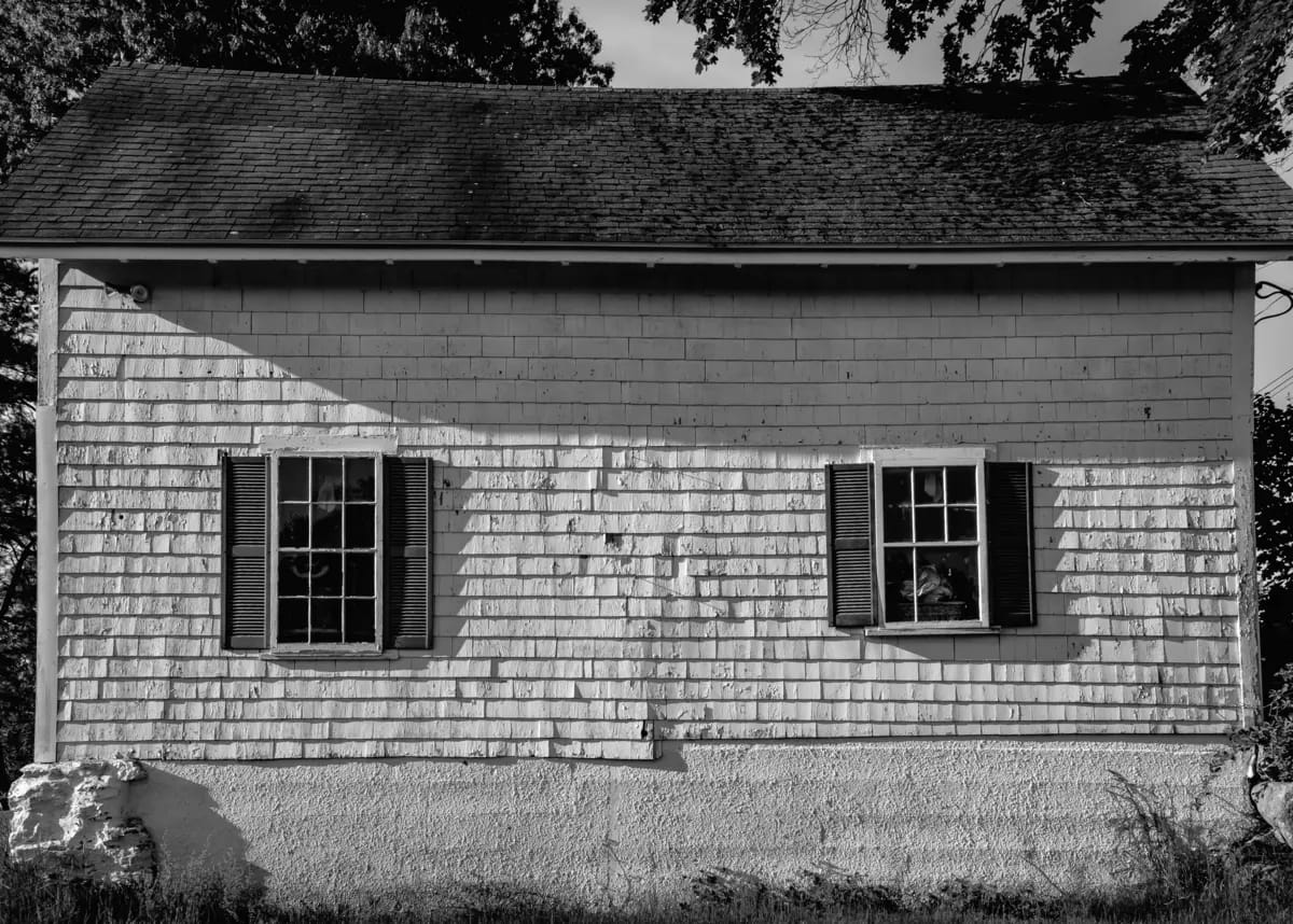 black and white sagging roof