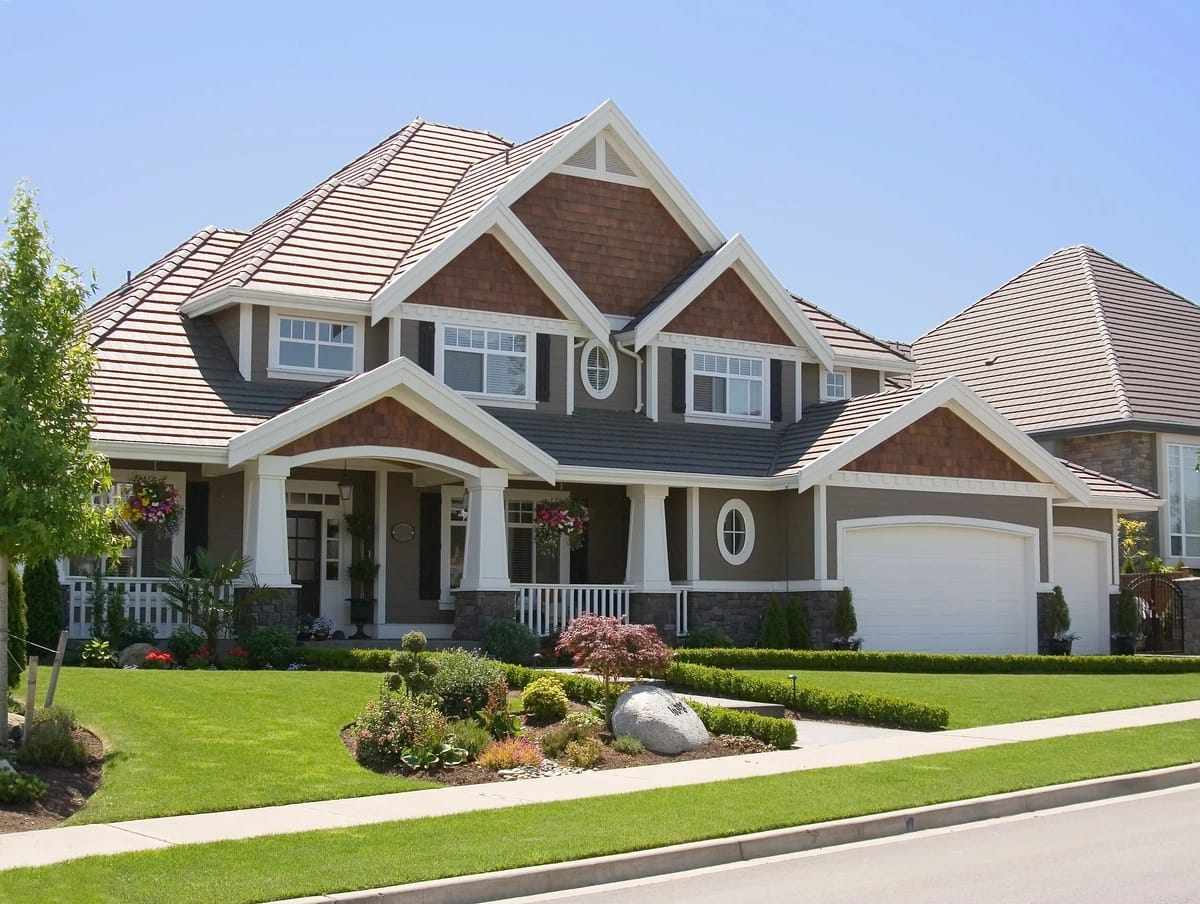 Luxurious new house with a beautiful front yard