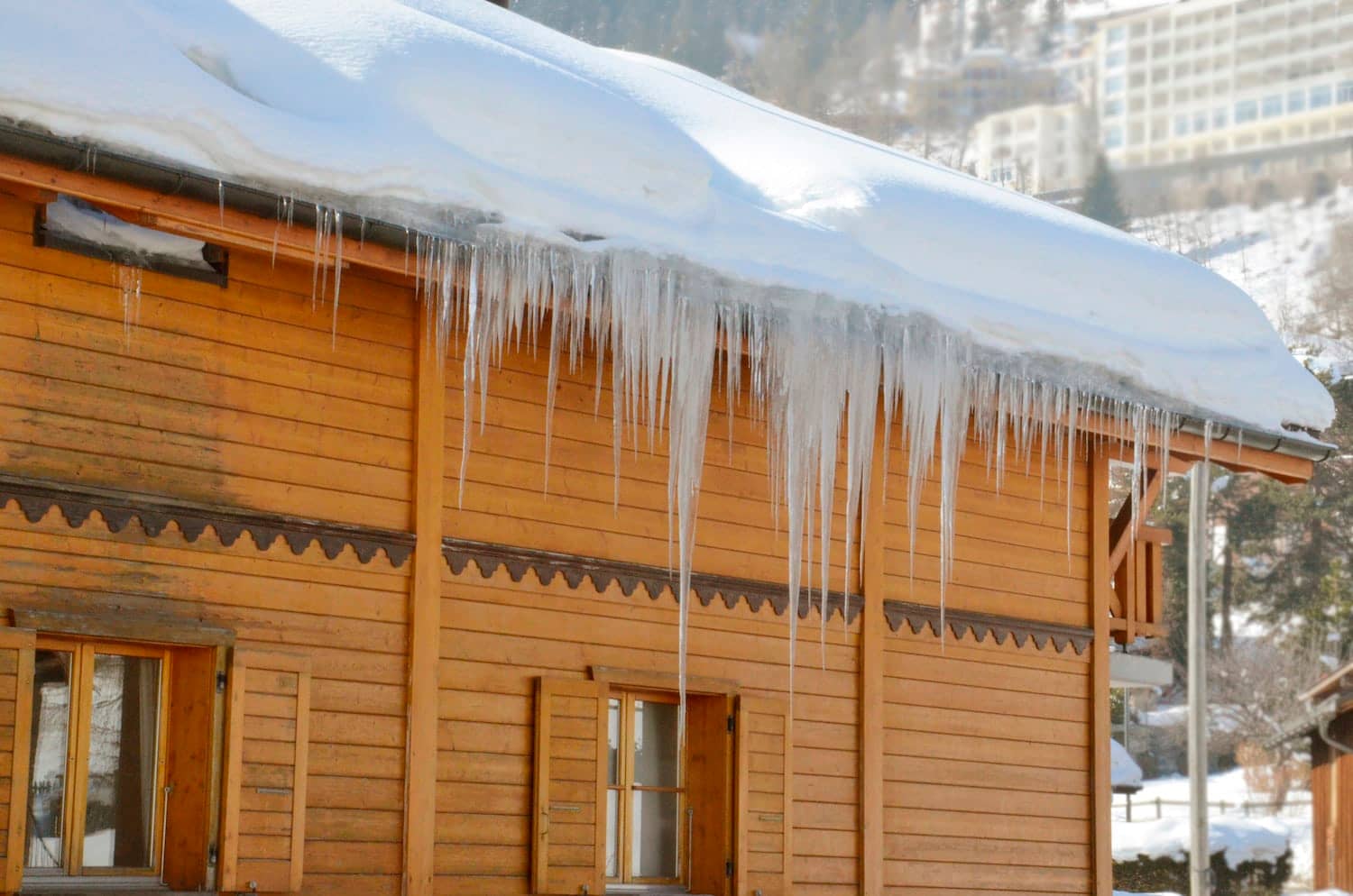 ice damage roof icicle and snow buildup