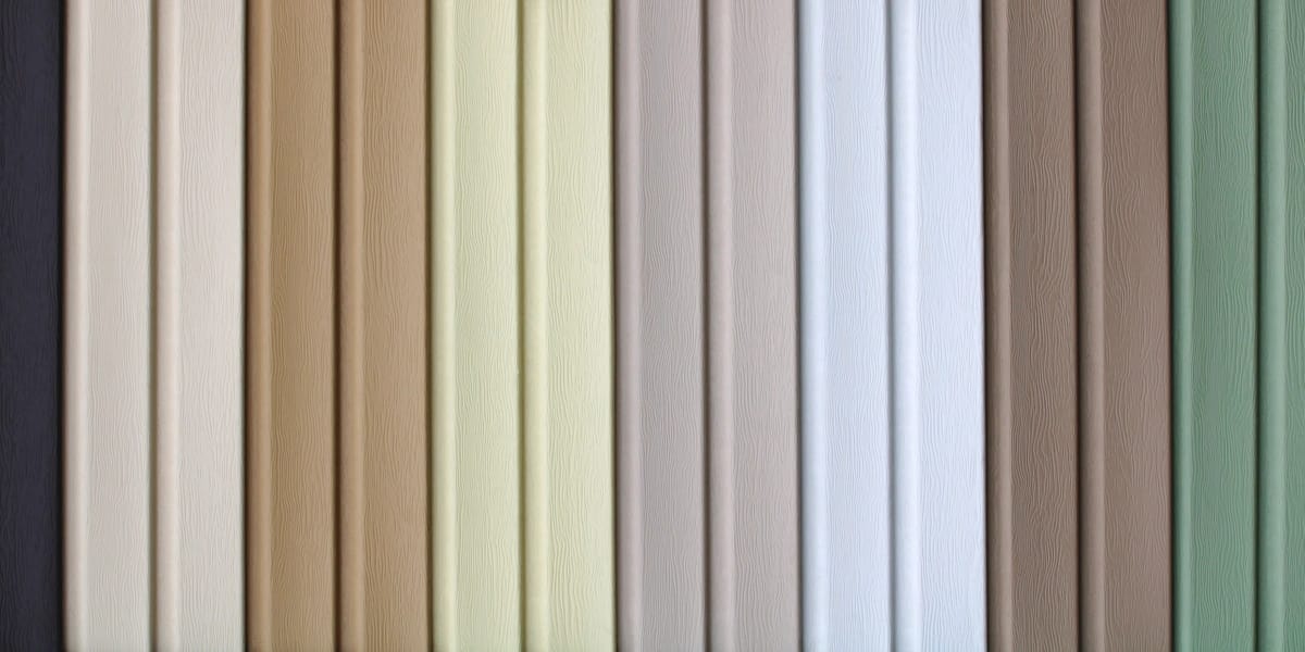 Vertical stripes of everlast siding colors, including beige, ivory, gray, white, and green, arranged in a pattern. The texture appears smooth and the colors are muted and earthy, creating a calming visual effect.
