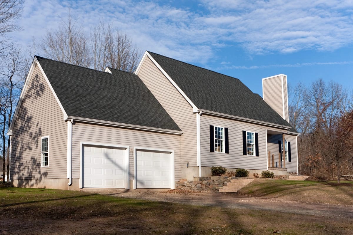 tan vinyl siding home
