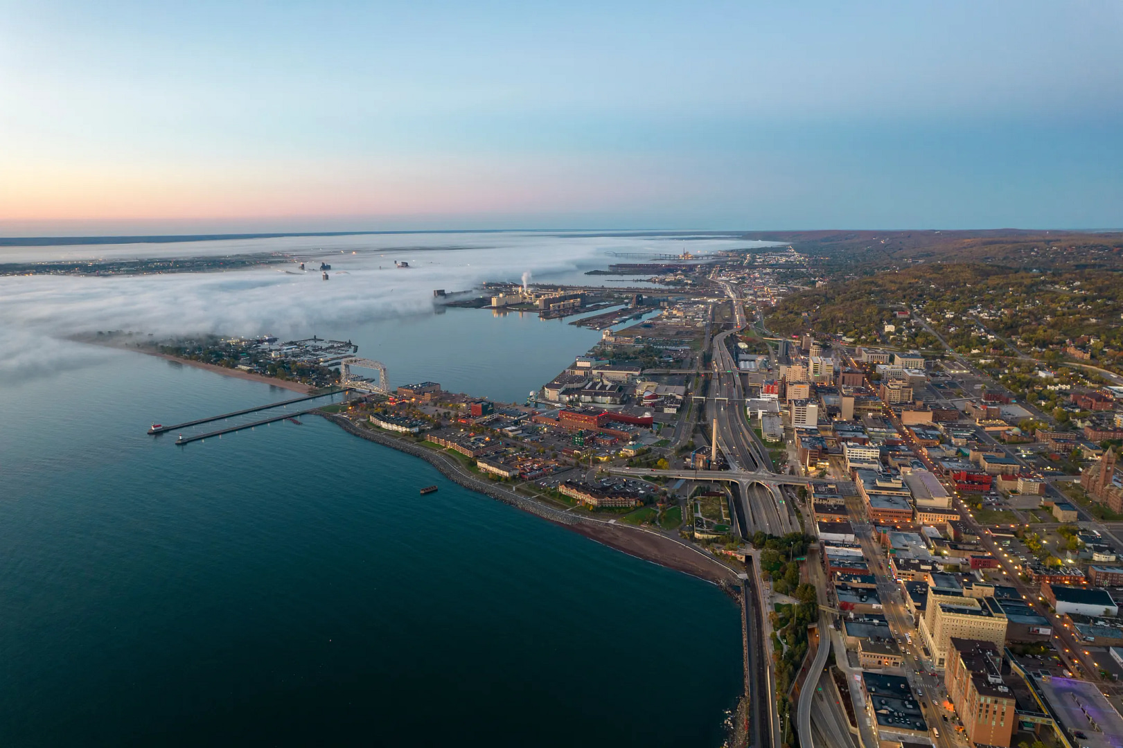 Scenic view of the Duluth skyline at sunset, symbolizing the local focus of Duluth SEO services designed to help businesses improve search rankings, increase visibility, and drive traffic in the Duluth area through targeted digital marketing strategies.