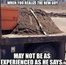 Construction meme of pile of dirt strapped to truck.