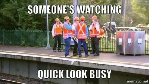 Construction men standing around. Construction memes are always there for a good laugh.
