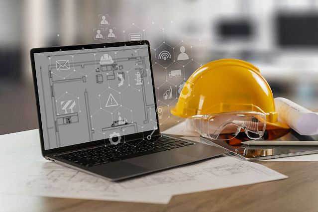 On a desk, a laptop showcases architectural plans alongside AI website design icons. Nearby, a yellow hard hat, safety goggles, rolled-up blueprints, and a pen suggest construction essentials. Overlay icons symbolize construction concepts against a blurred office backdrop, reflecting tools for home service contractors.
