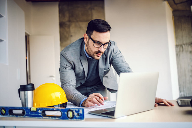 man working on commercial roofing website inspiration