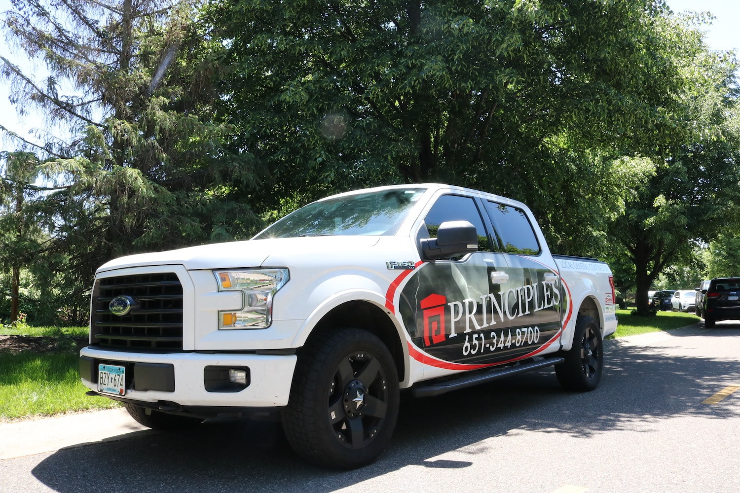 principles building and remodeling truck wrap