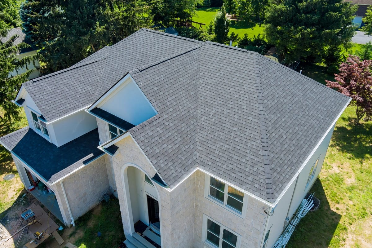 large home shingle roof new