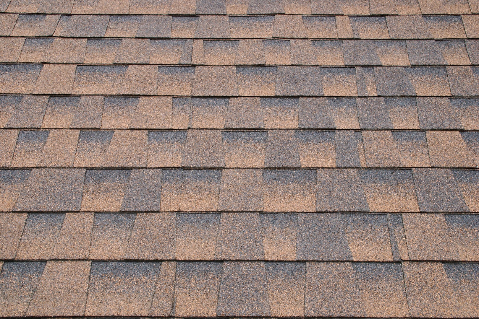 composite roofing cost-close up of brown composite shingles