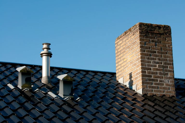 black tile roof and vents installed on