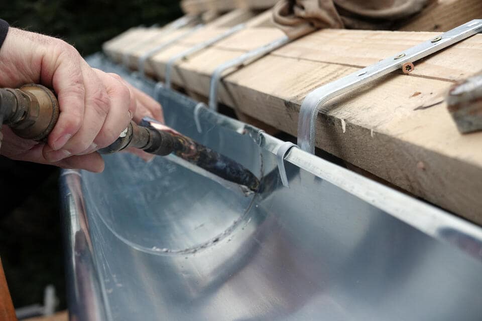 How To Repair Gutter Seams (Prevent Leaks, Clogs, & More)