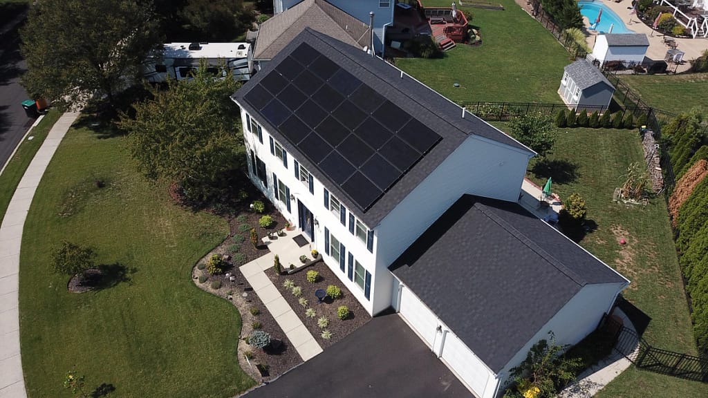 Solar panel roof installation on a beautiful home in the Philadelphia suburbs