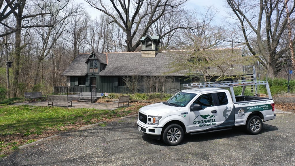 O'Donnell Roofing truck in front of a havertown roofing project