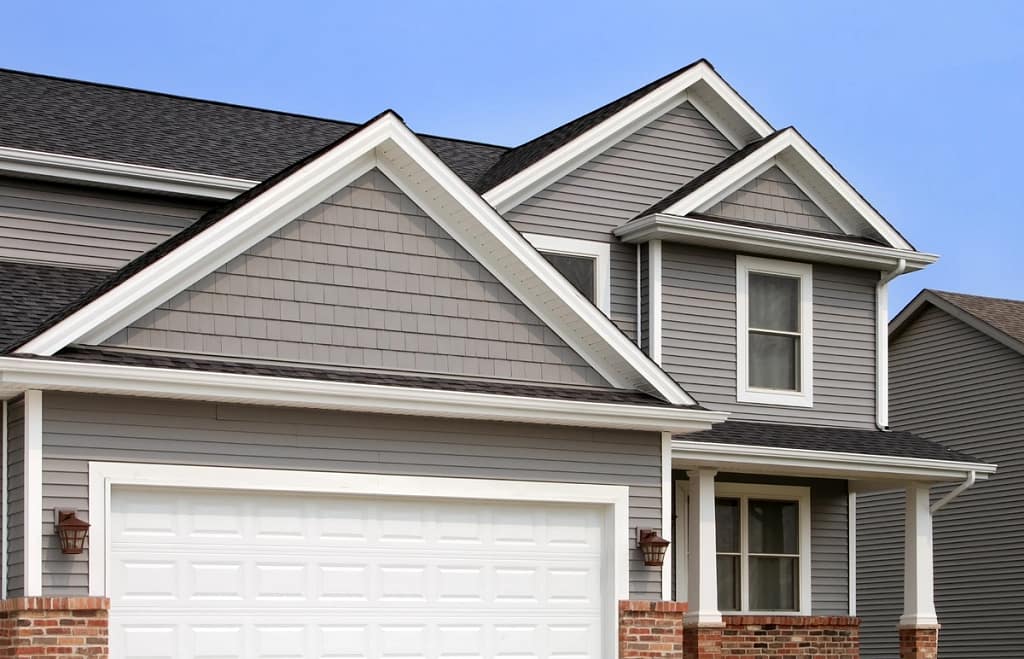 grey home with vinyl windows