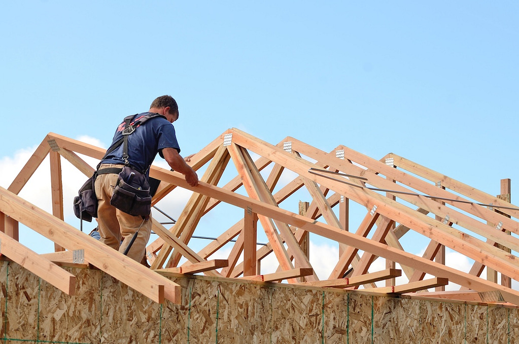 Layout and installation of roof rafters on a new commercial residential construciton project