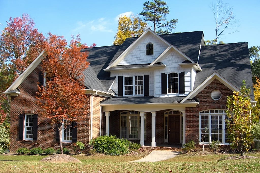 House with black roof with autumn weather