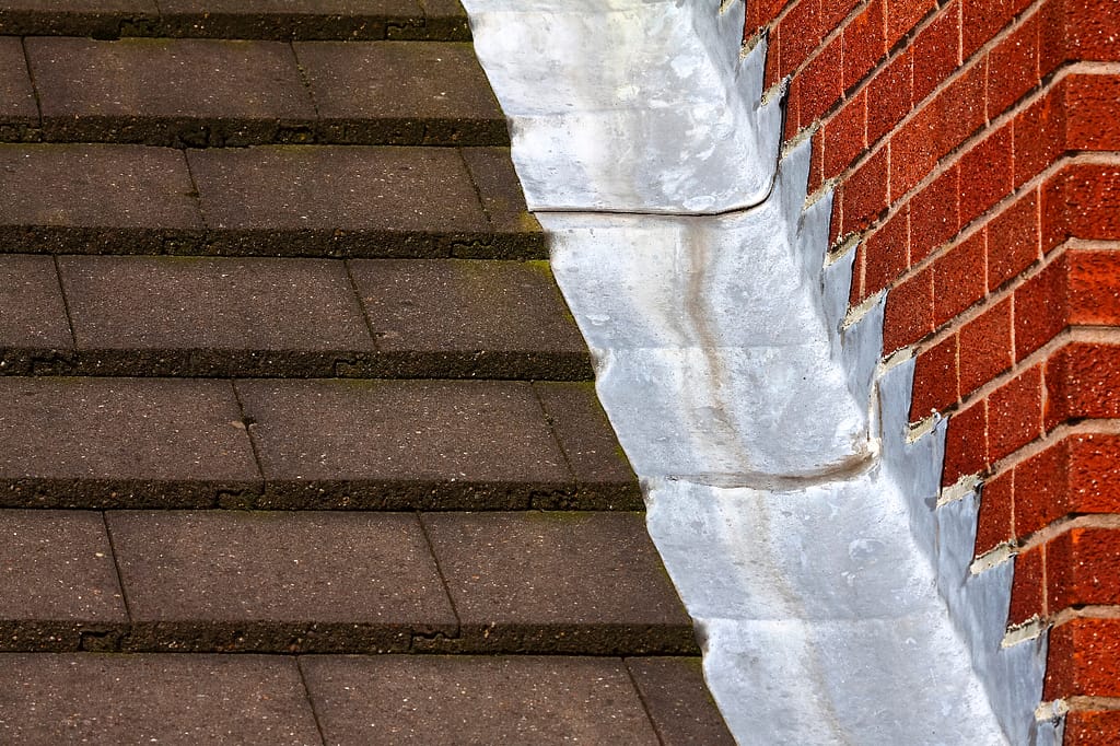 An image showcasing roof flashing installation for weather protection
