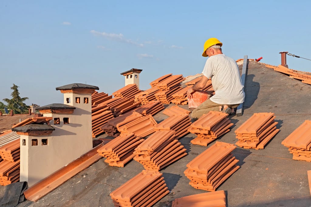 installing tiles on a roof