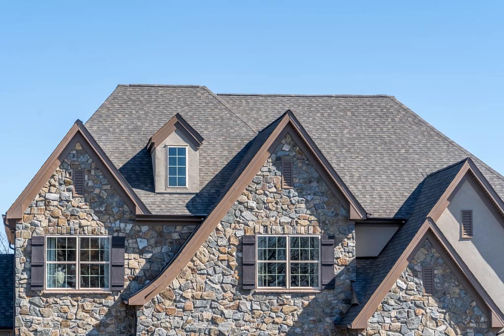 shingle roofing for stone home