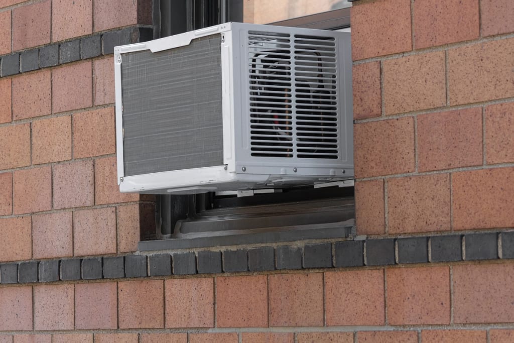 brick siding window ac