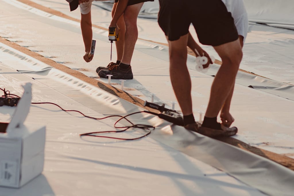 contractors perform roof replacement and commercial roofing services