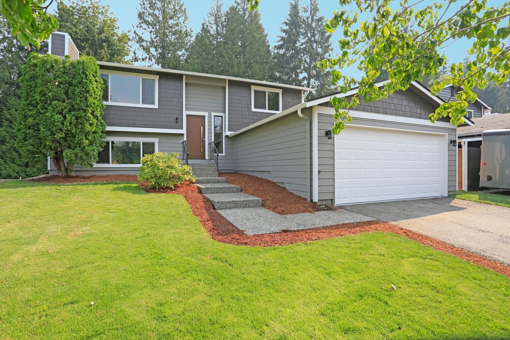 American house with new installed grey siding