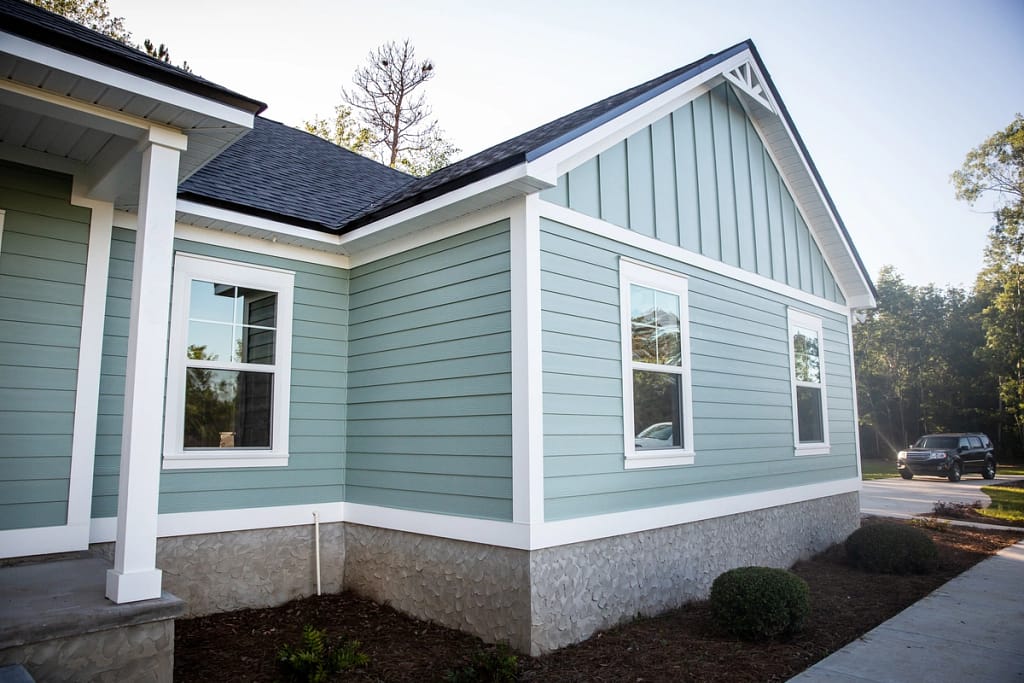 blue siding on ranch style house