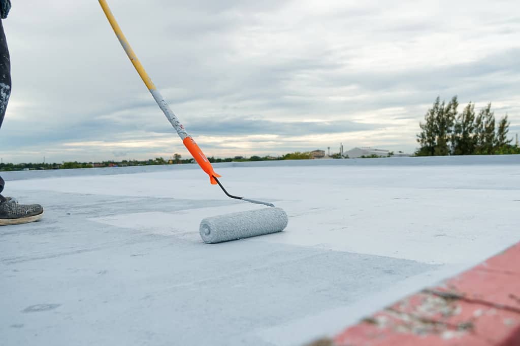 applying roof coating