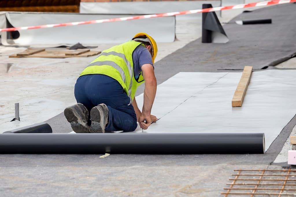 cutting roof material on a commercial roof