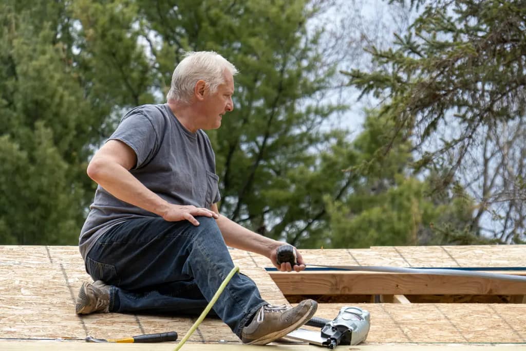 homeowner measuring roof pitch