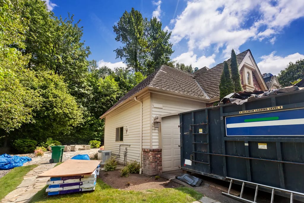 dumpster and roof