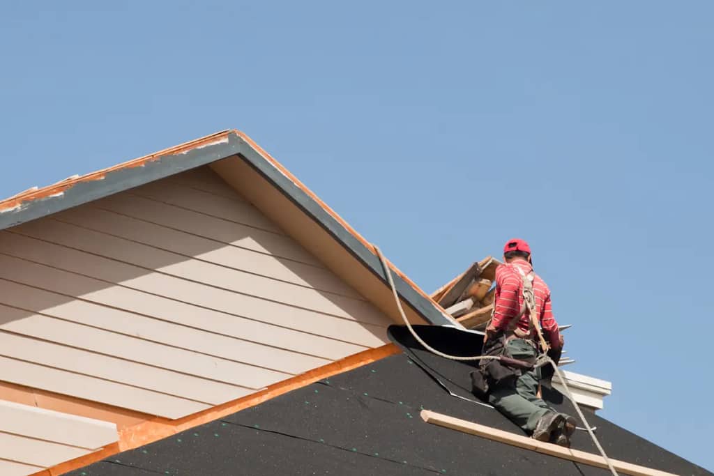 roofer working on replacement