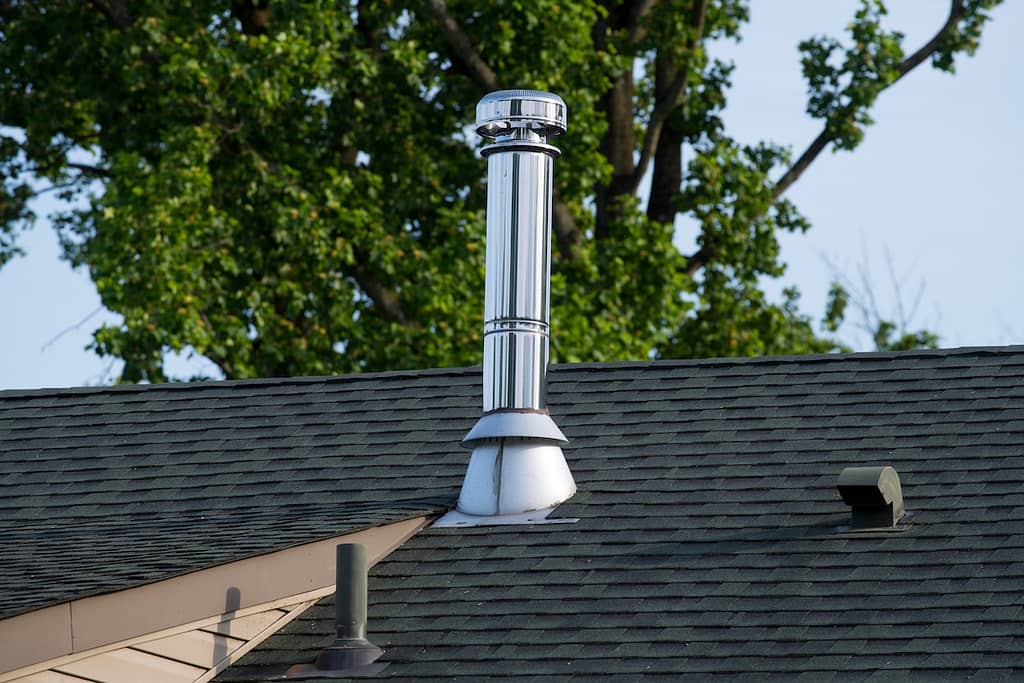 Pipe chimney with roof boot