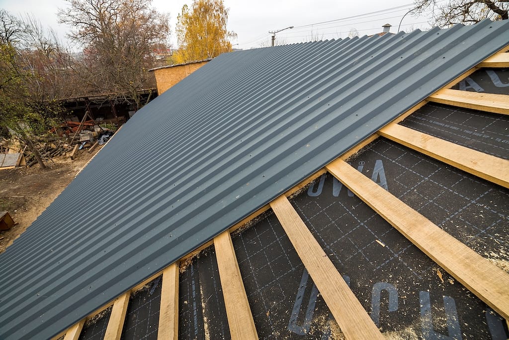 roof underlayment under metal roofing material