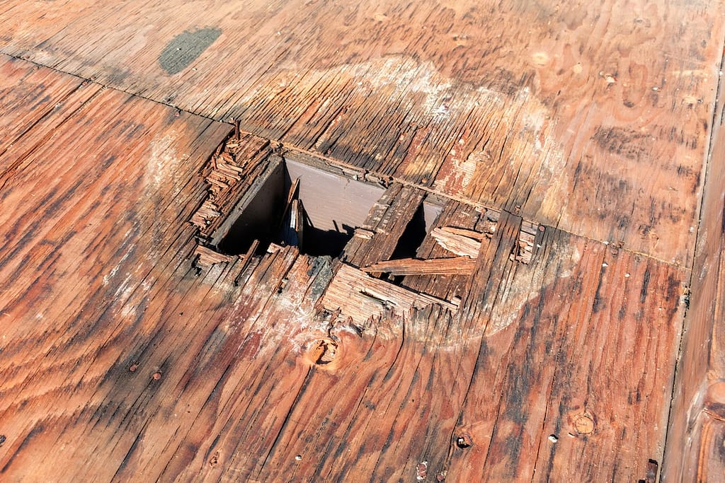 roof sheathing damaged, hole