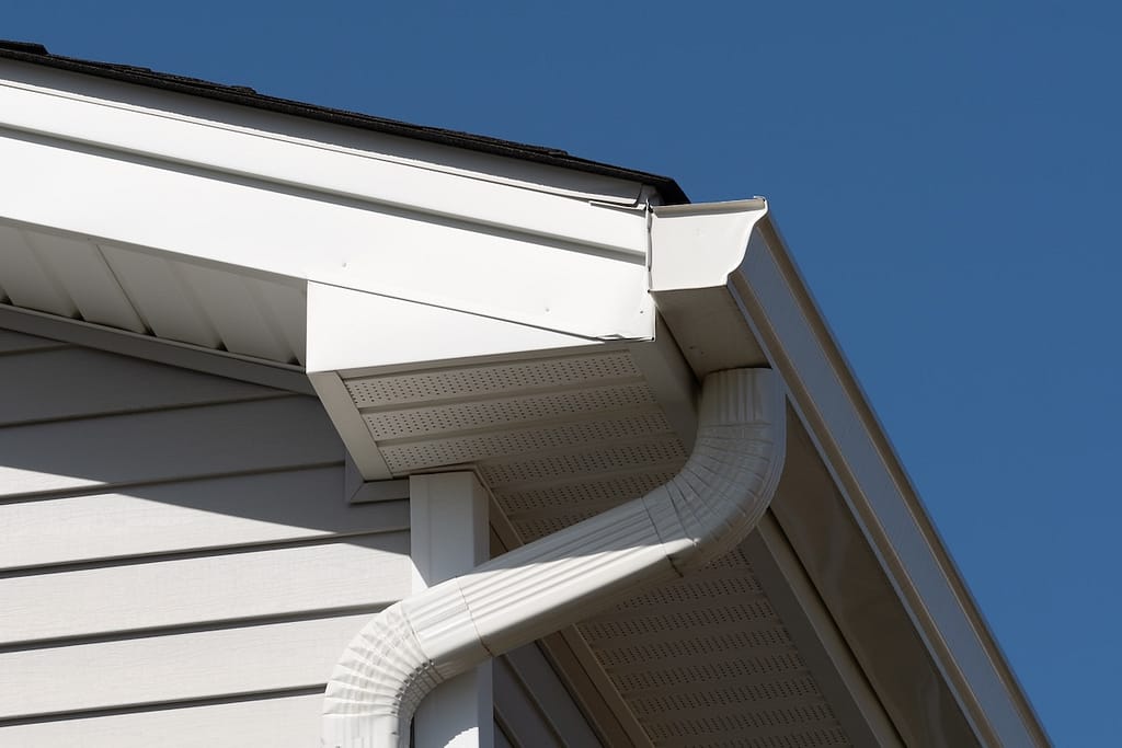 White fascia and soffit on tan house