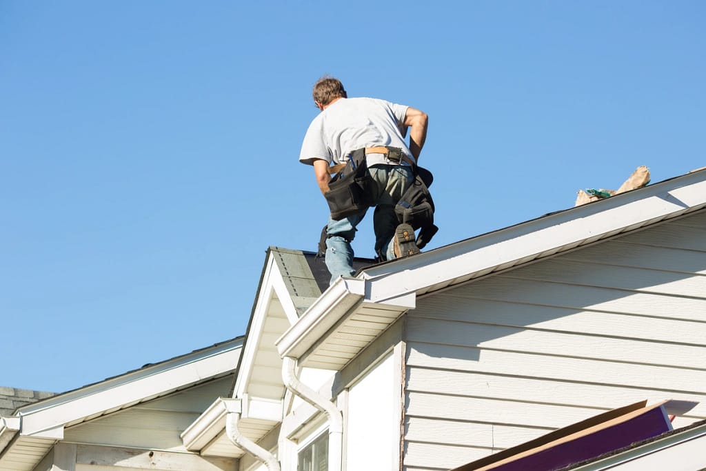 roofing contractor shows how to perform roof replacement