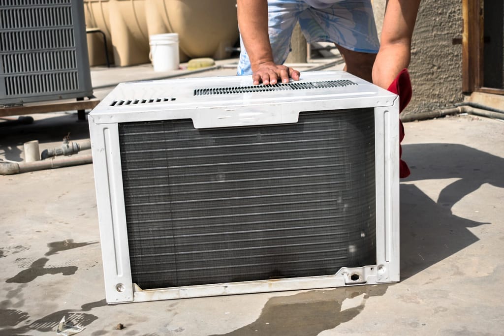 contractor shows how to install window ac unit step by step