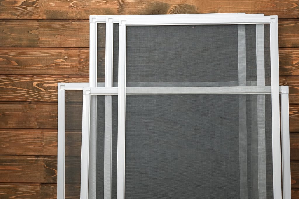 window screen on wooden background