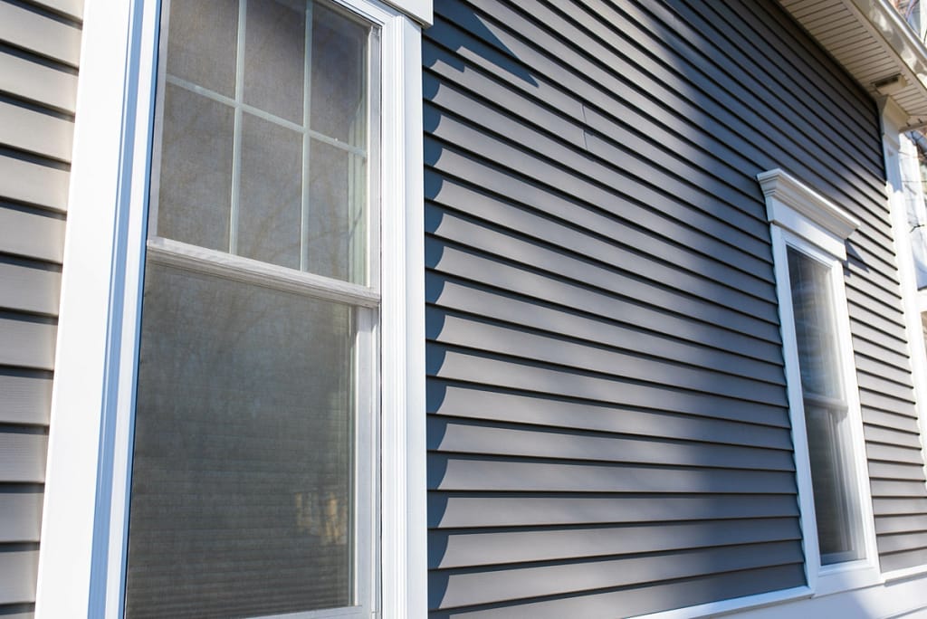 close up of james hardie grey siding