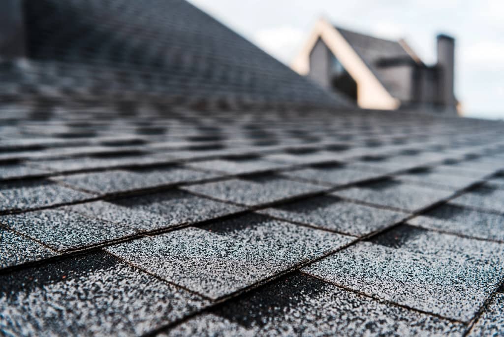 A close up of an asphalt shingle roof