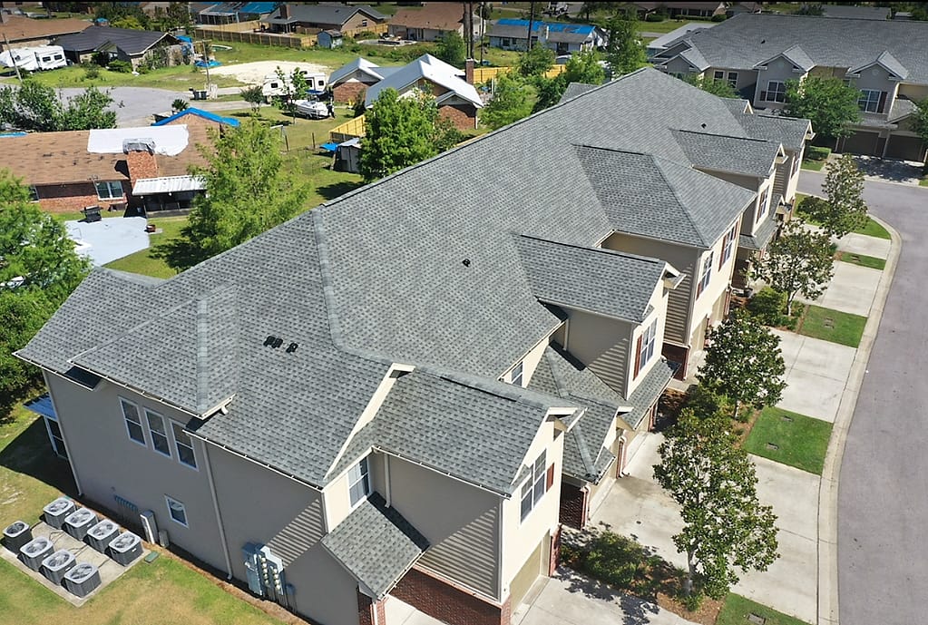 roofing panama city-new gray shingles on residential complex