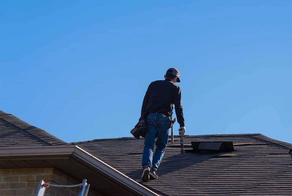 professional roof inspection checking for signs to replace roof