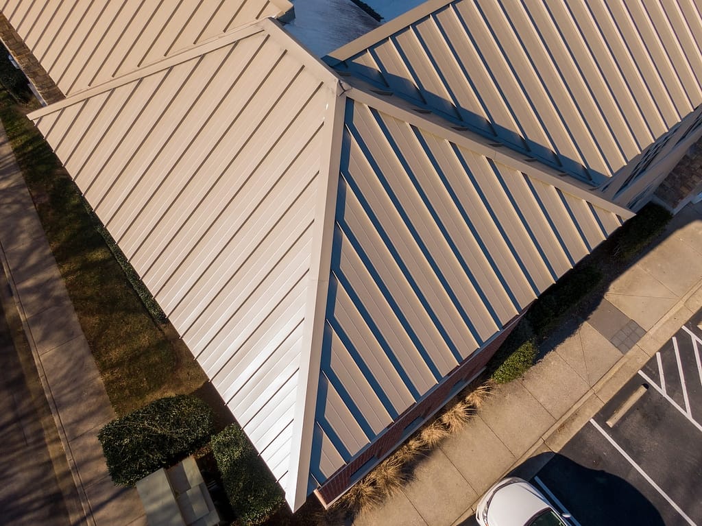 brown standing seam metal roof aerial view