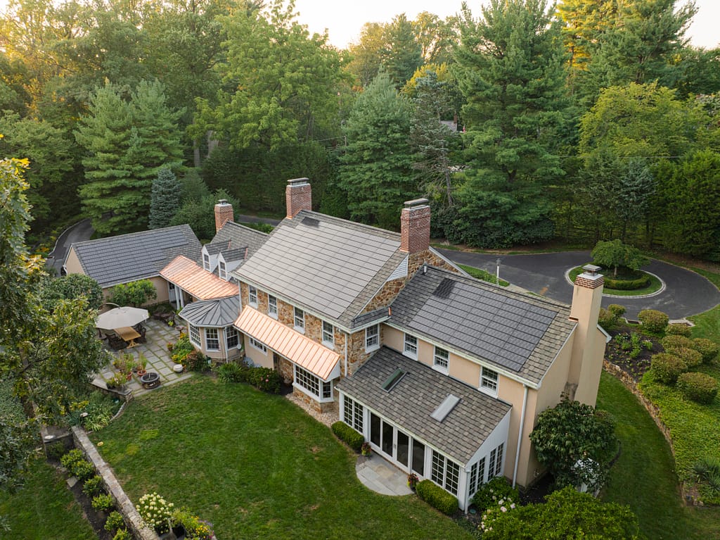 Copper Metal Roof Accents Solar Shingles and Grand Manor Luxury Shingles