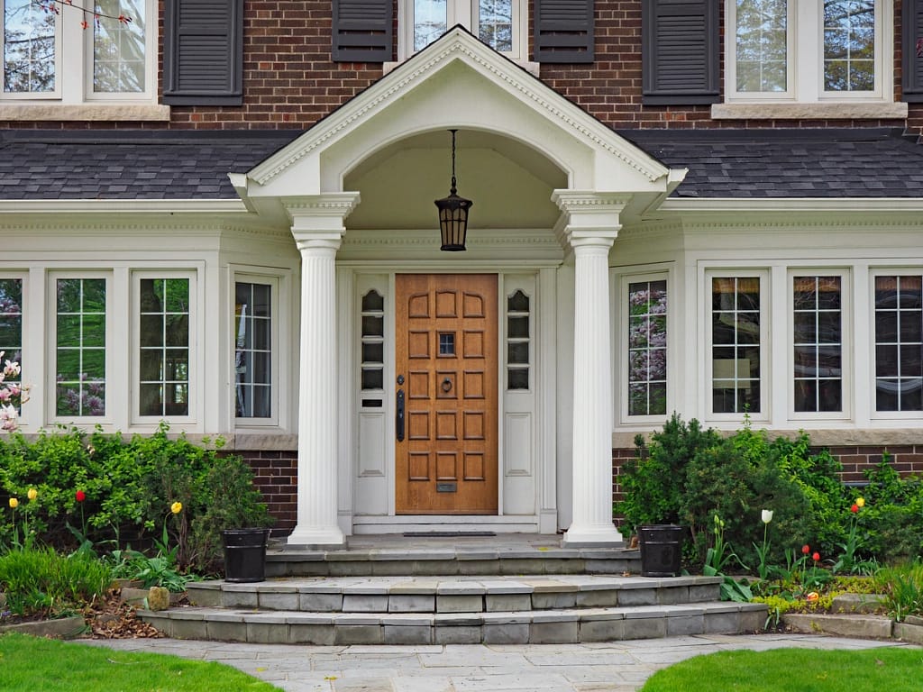 brick house with a colonial portico
