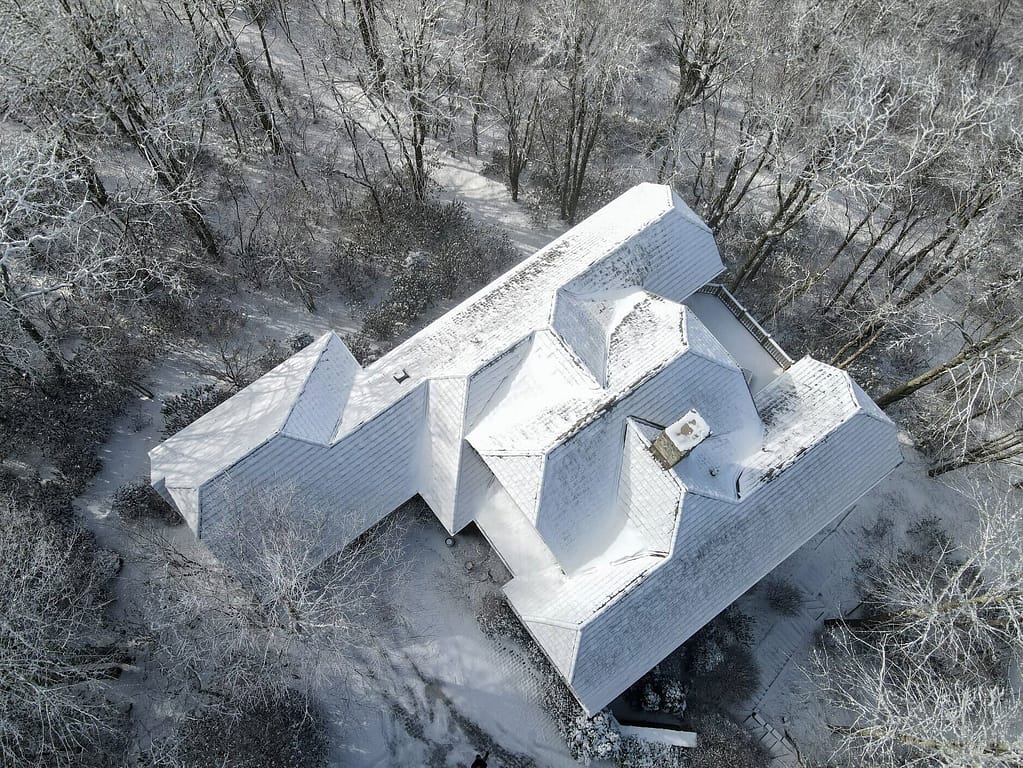 house roof covered with snow