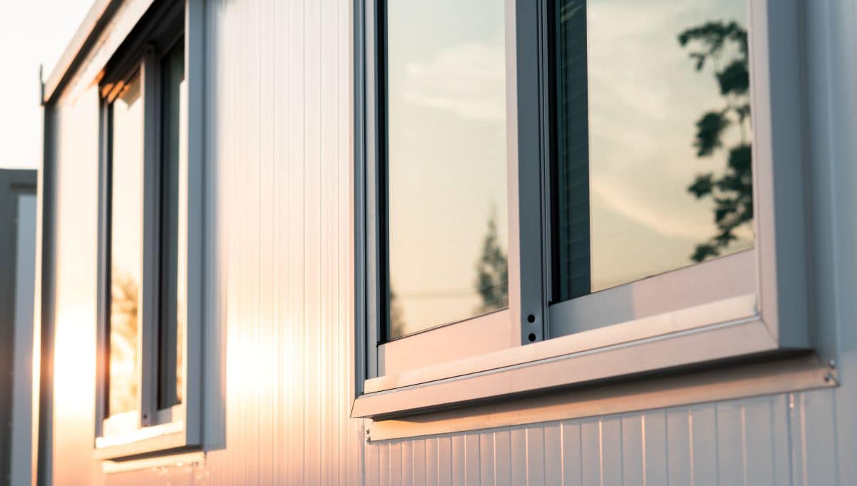 windows on a house in the sunset