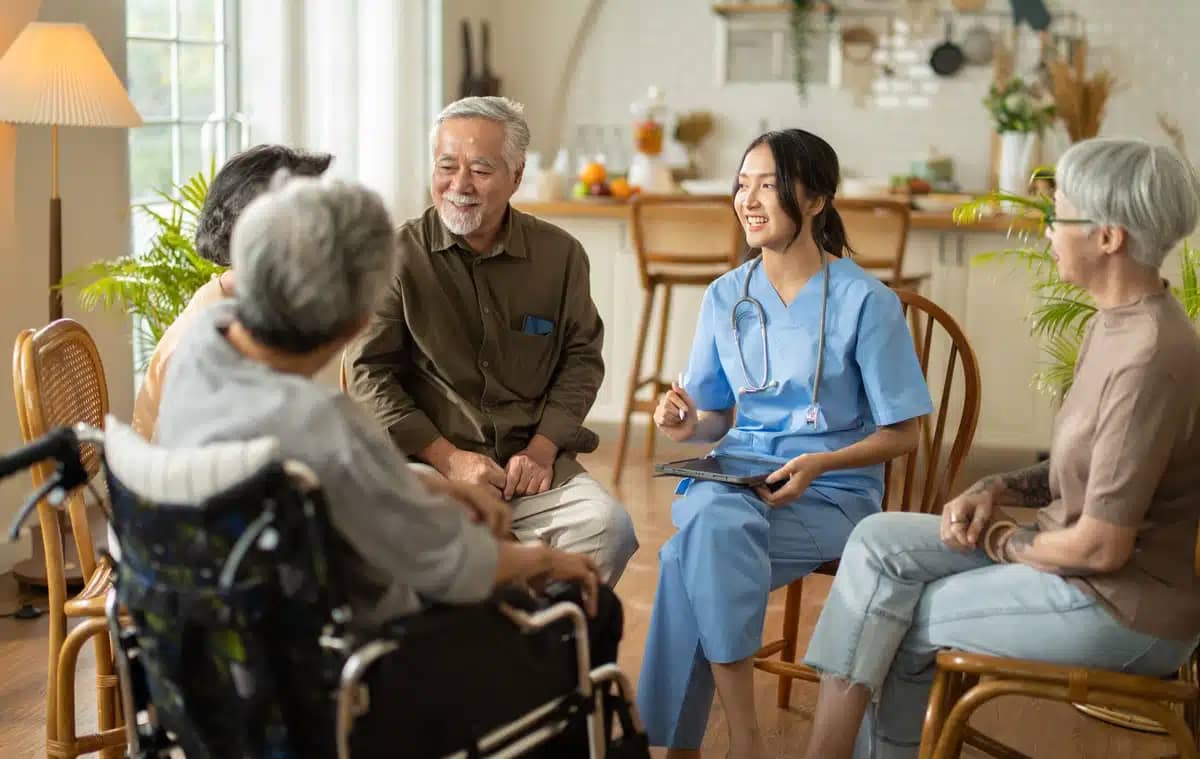 group of assisted living facility residents and nurse